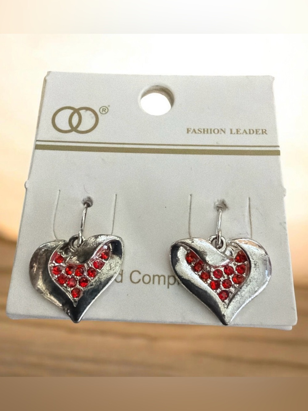 Silver Tone Heart Earrings with Red Crystals